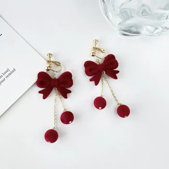 Hiver vin rouge flocé arc Pom boule oreille Clips boucles d'oreilles nouvel an noël Long gland nœud papillon pince sur boucles d'oreilles sans Piercing 4