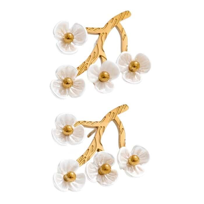 Boucle d'oreille fleurs blanches