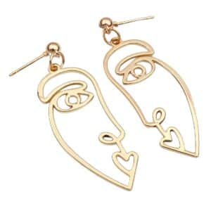 Boucle d'oreille visage abstrait
